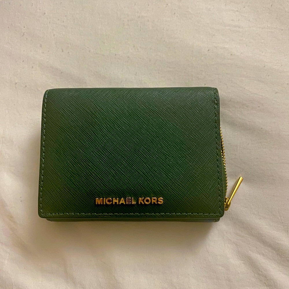Gently used green Michael Kors Wallet.